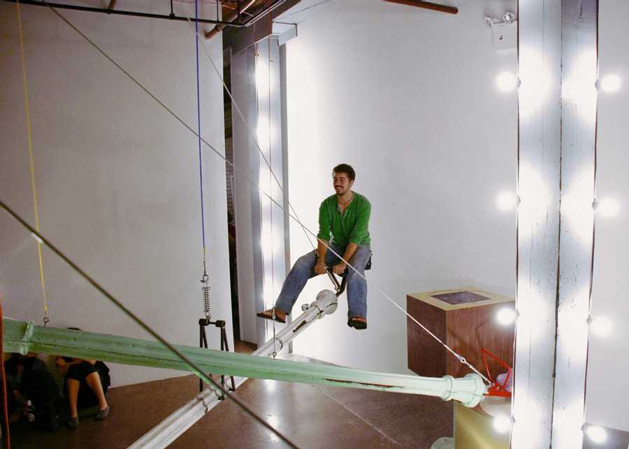 Man riding see-saw